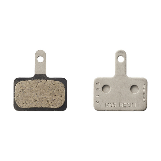 SHIMANO - M05-RX Pastillas de resina y muelle con pasador de aletas (par)